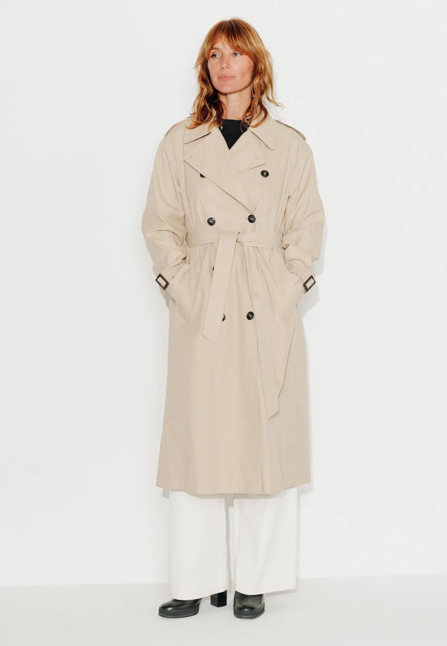 trench-coat-amandier-trench-long-ceintur-en-coton-d-perlant-beige image 1